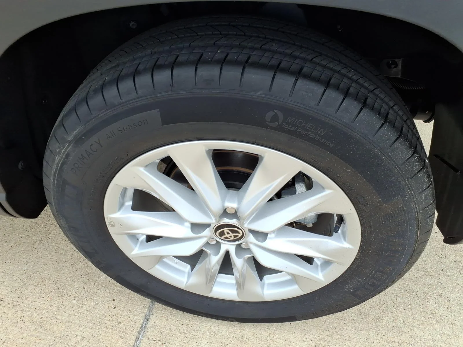 Used 2024 Blue Crush Metallic Toyota LE image 19