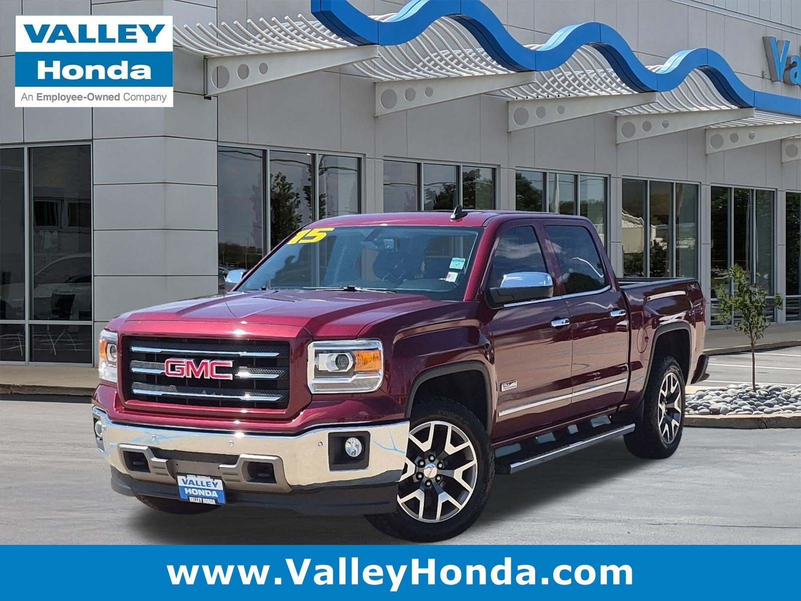 Used 2015 Sonoma Red Metallic GMC SLT 4WD image 1