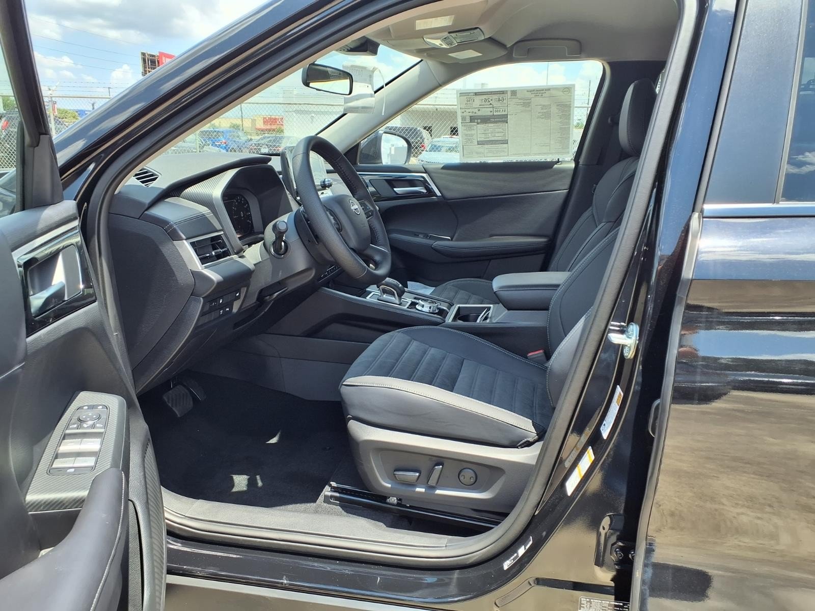 2026 Nissan Rogue Plug-In Hybrid SL Black at Sterling McCall Nissan
