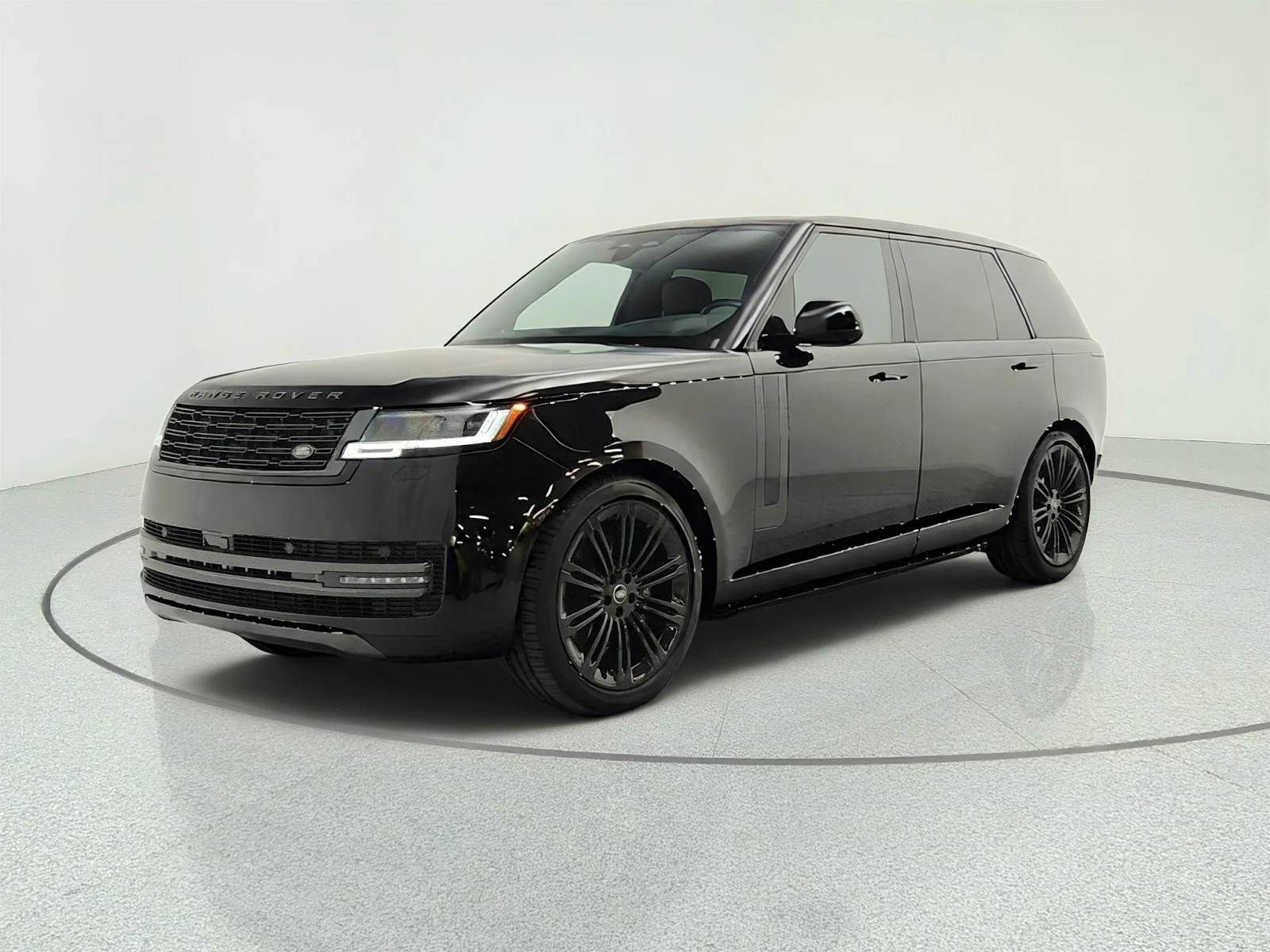 Used 2025 Santorini Black Metallic Land Rover P400 SE LWB 7 Seat image 1