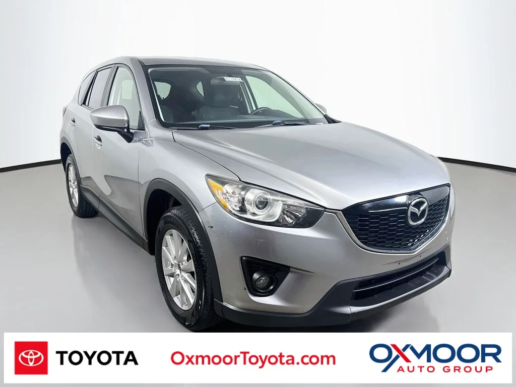 Used 2015 Liquid Silver Mazda Touring image 1