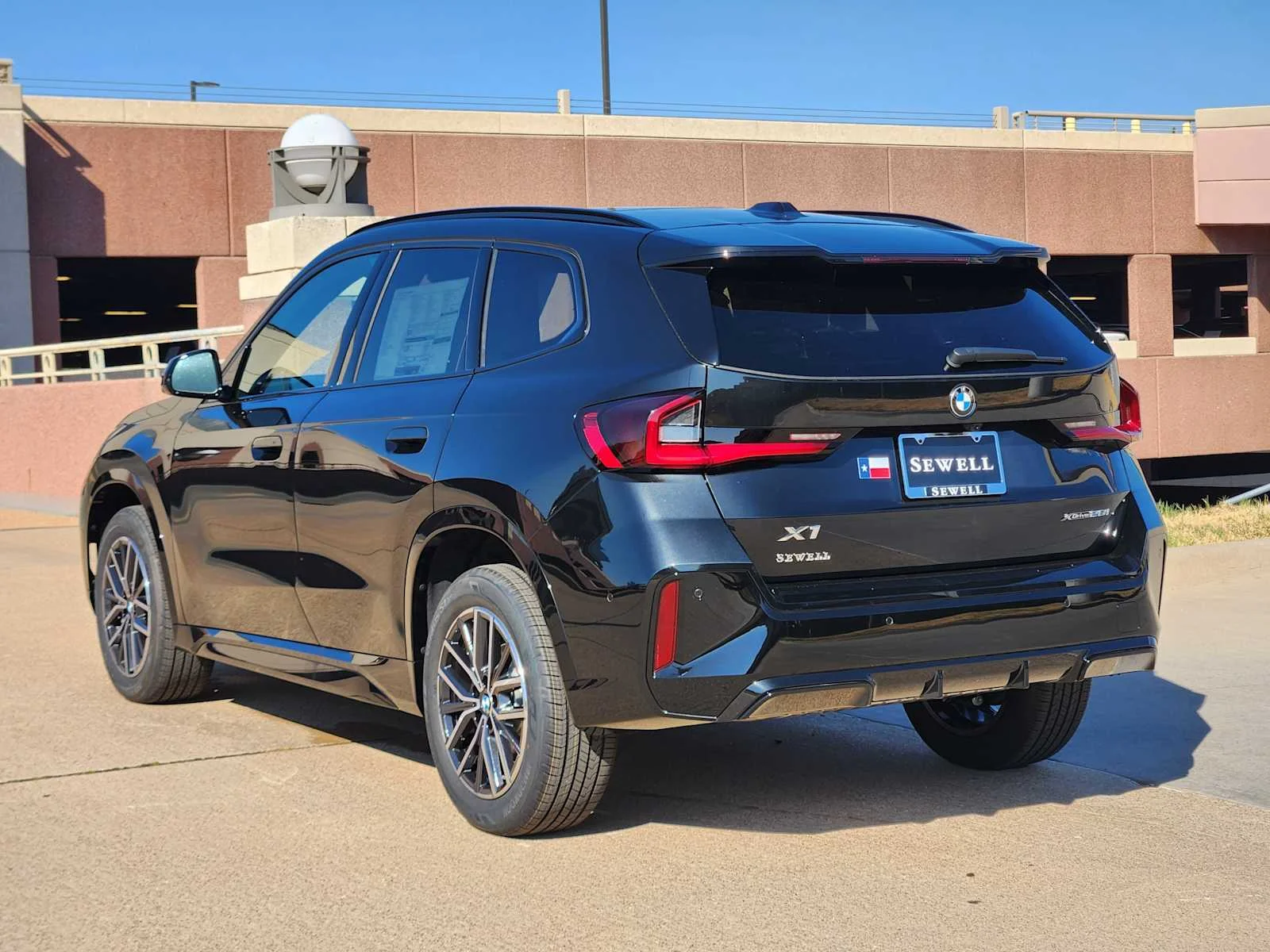 New 2027 Black Sapphire Metallic BMW xDrive28i image 3