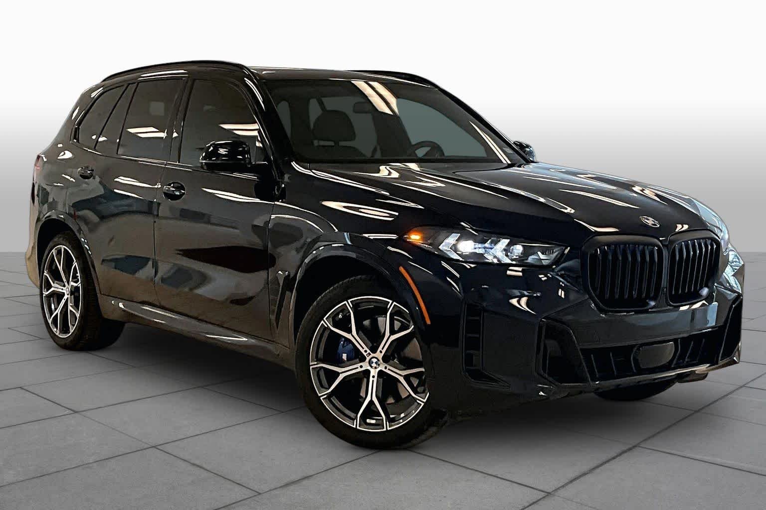 Used 2024 Carbon Black Metallic BMW xDrive40i image 2