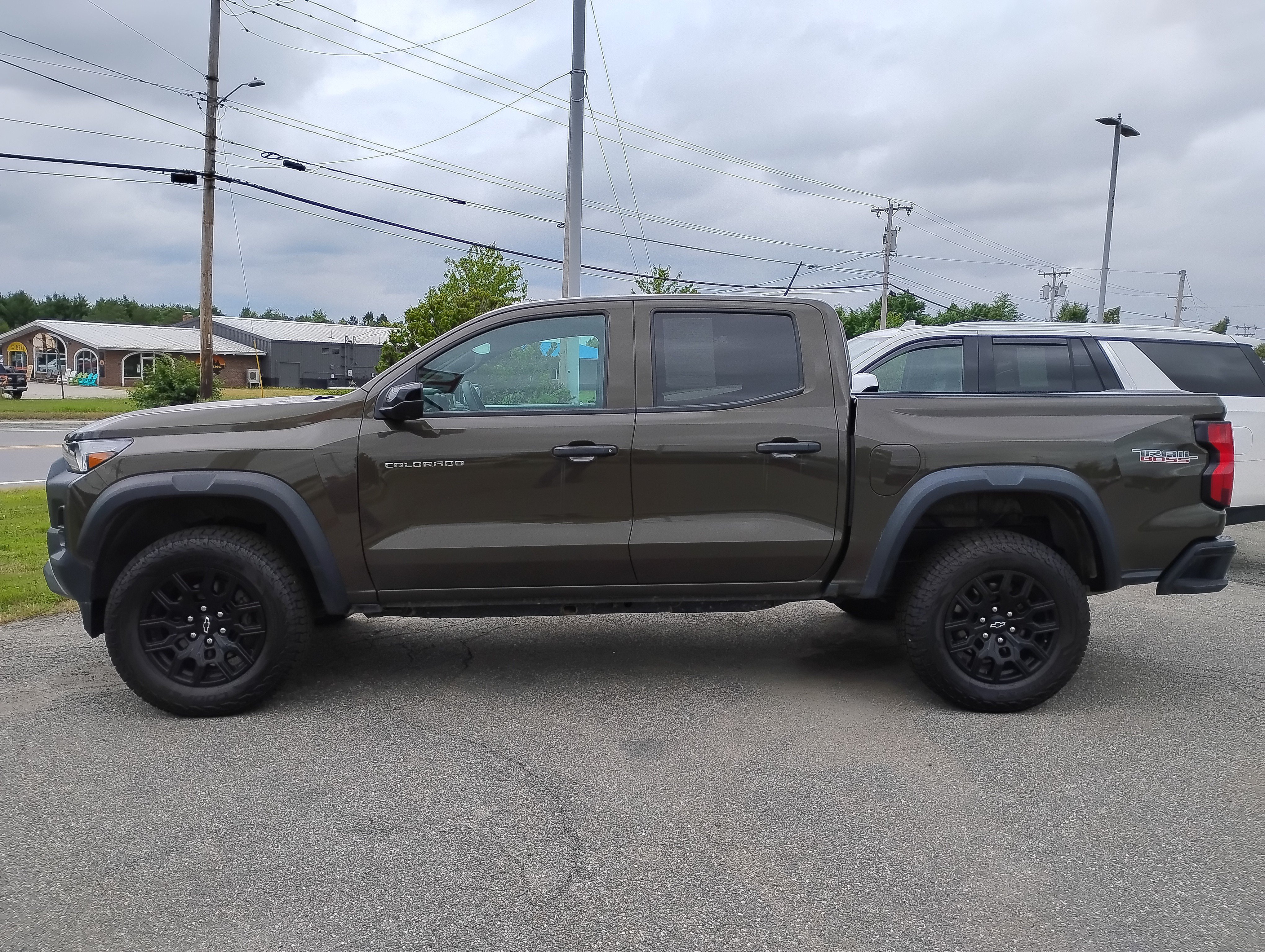 Used 2023 Harvest Bronze Metallic Chevrolet 4WD Trail Boss image 4