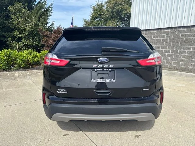 Certified Used 2024 Agate Black Metallic Ford SEL image 8