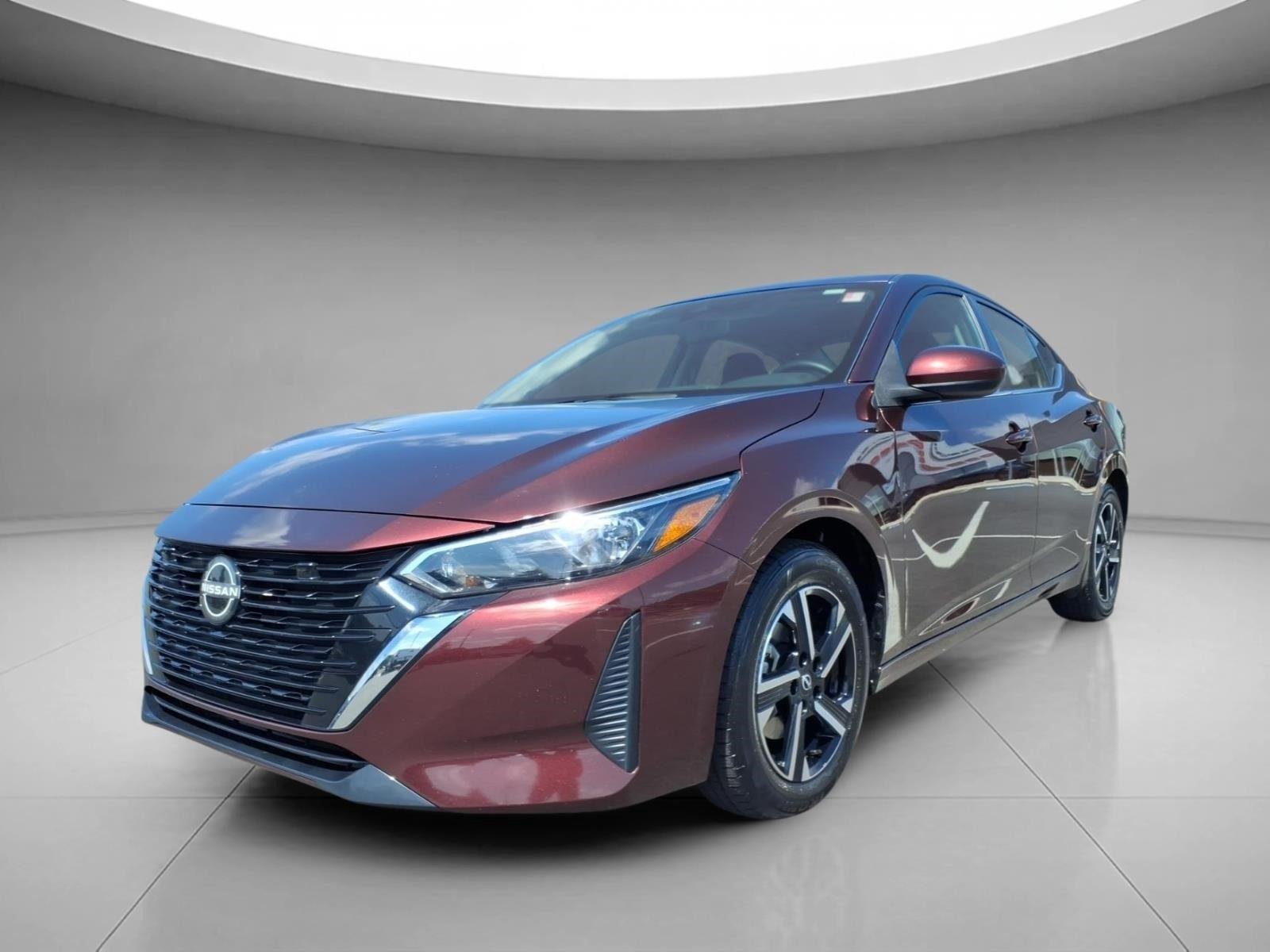Used 2025 Rosewood Metallic Nissan SV image 1