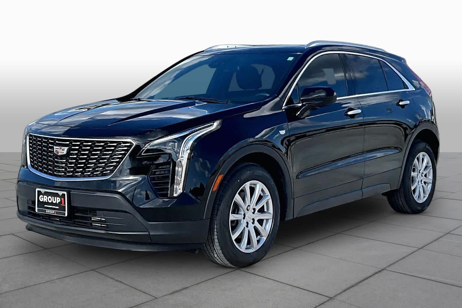 Used 2023 Stellar Black Metallic Cadillac FWD Luxury image 2