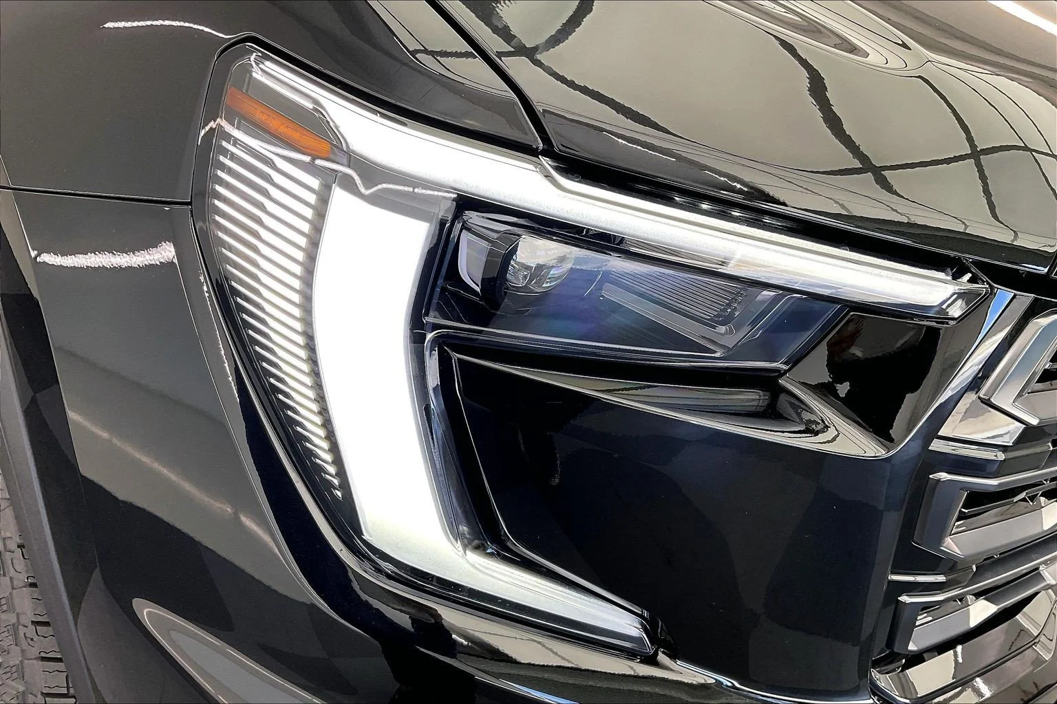 New 2026 Ebony Twilight Metallic GMC AWD AT4 image 15