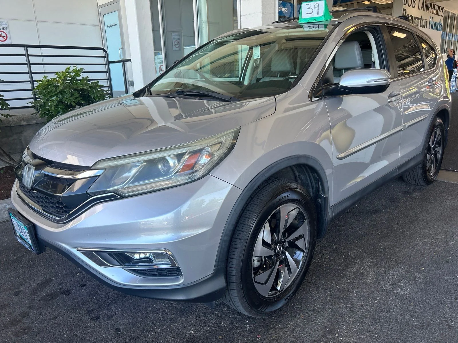 Used 2015 Alabaster Silver Metallic Honda Touring image 1