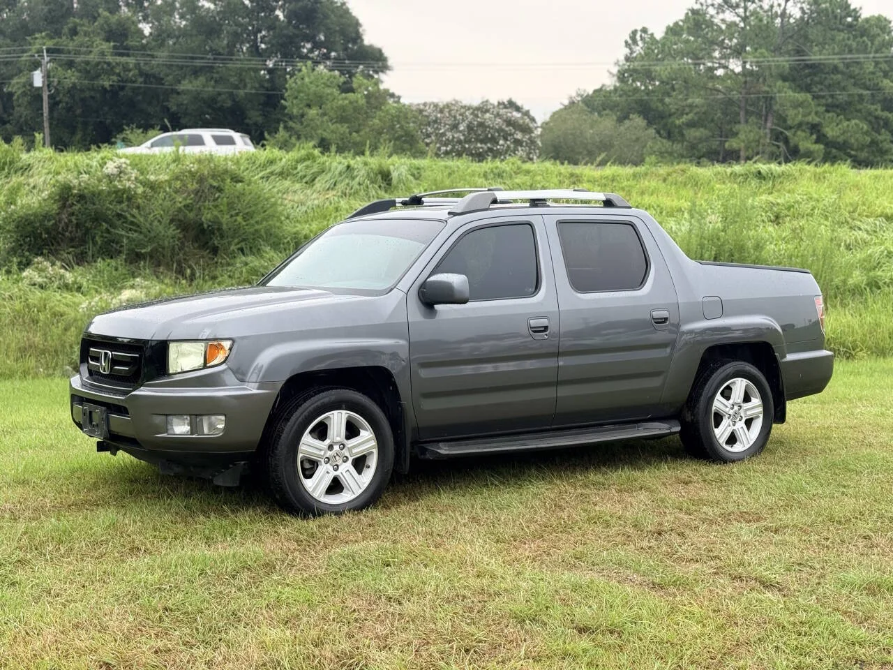 Used 2013 Gray Honda RTL 4x4 4dr Crew Cab image 1