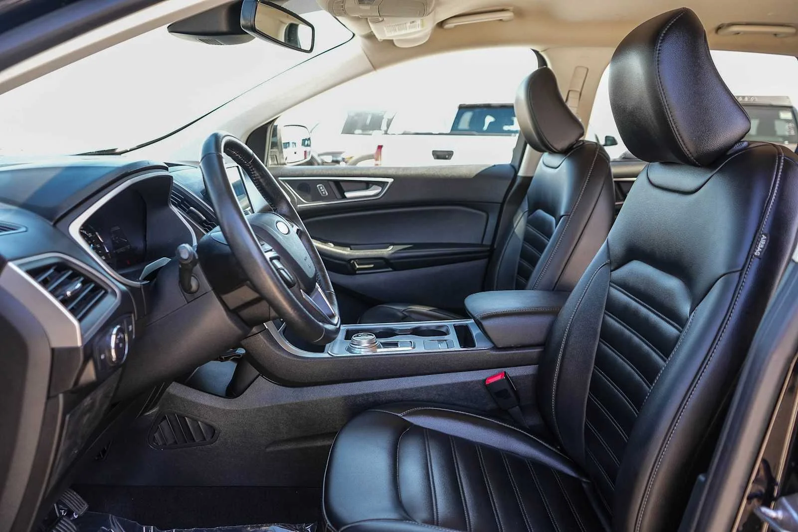 Used 2021 Agate Black Metallic Ford SEL image 19
