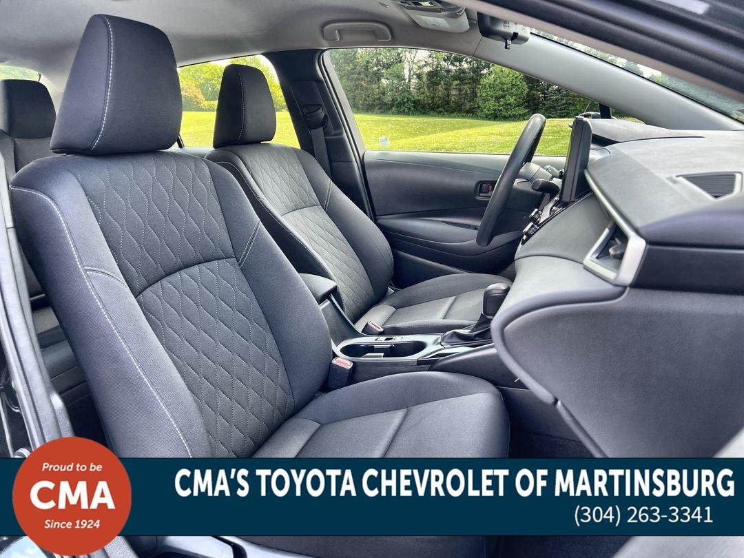 Used 2025 Midnight Black Metallic Toyota Hybrid LE image 21