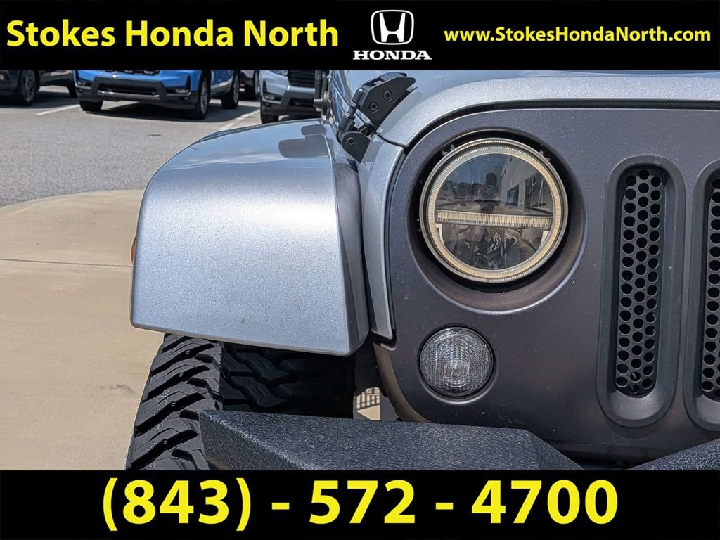 Used 2016 Silver Jeep Unlimited Sport S image 10