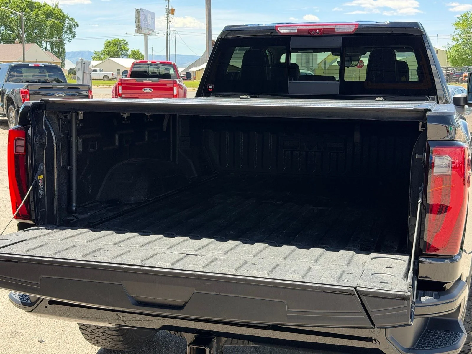 Used 2025 Black GMC Denali Ultimate image 9