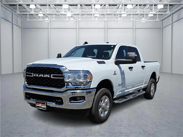Used 2024 Bright White Clearcoat RAM Big Horn 4x4 Crew Cab 6.3 ft. box 149 in. WB image 1