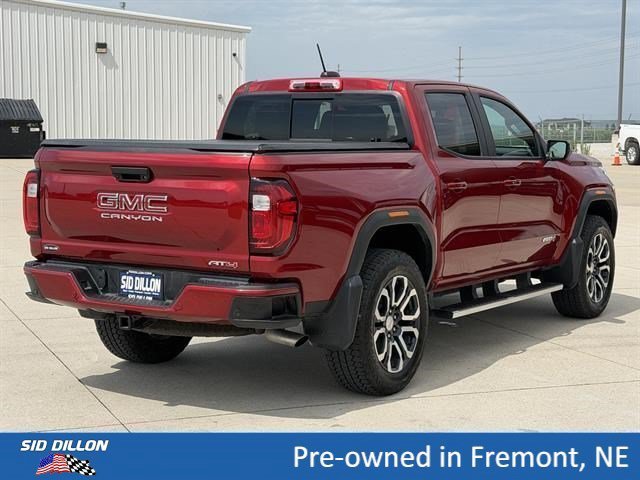 Used 2024 Volcanic Red Tintcoat GMC 4WD AT4 image 4