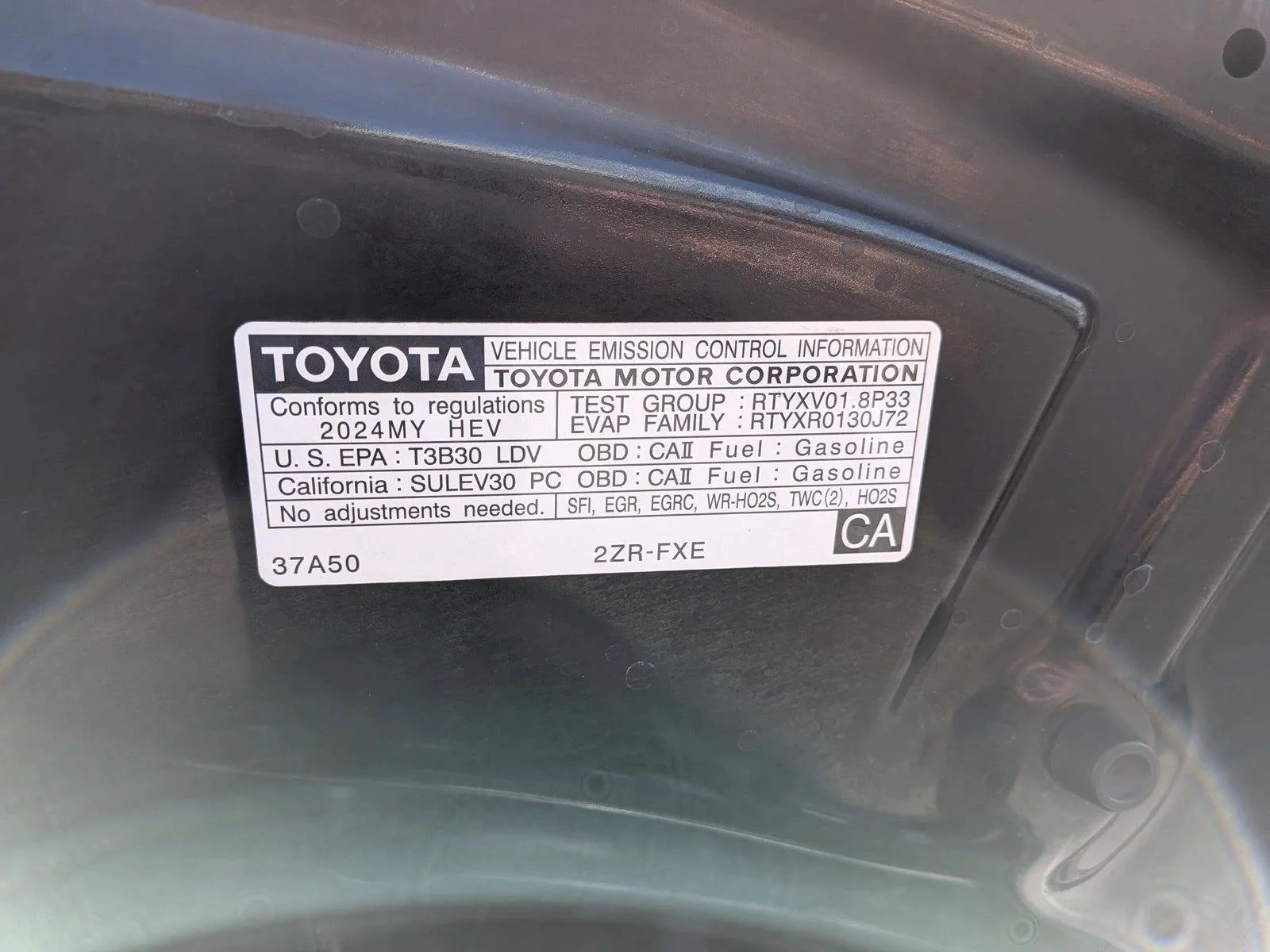 Used 2024 Midnight Black Metallic Toyota Hybrid LE image 23