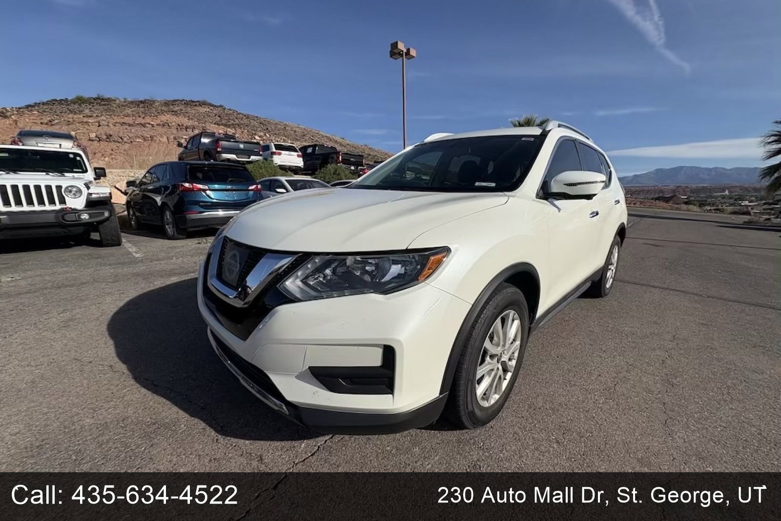 Used 2017 Pearl White Nissan SV image 1