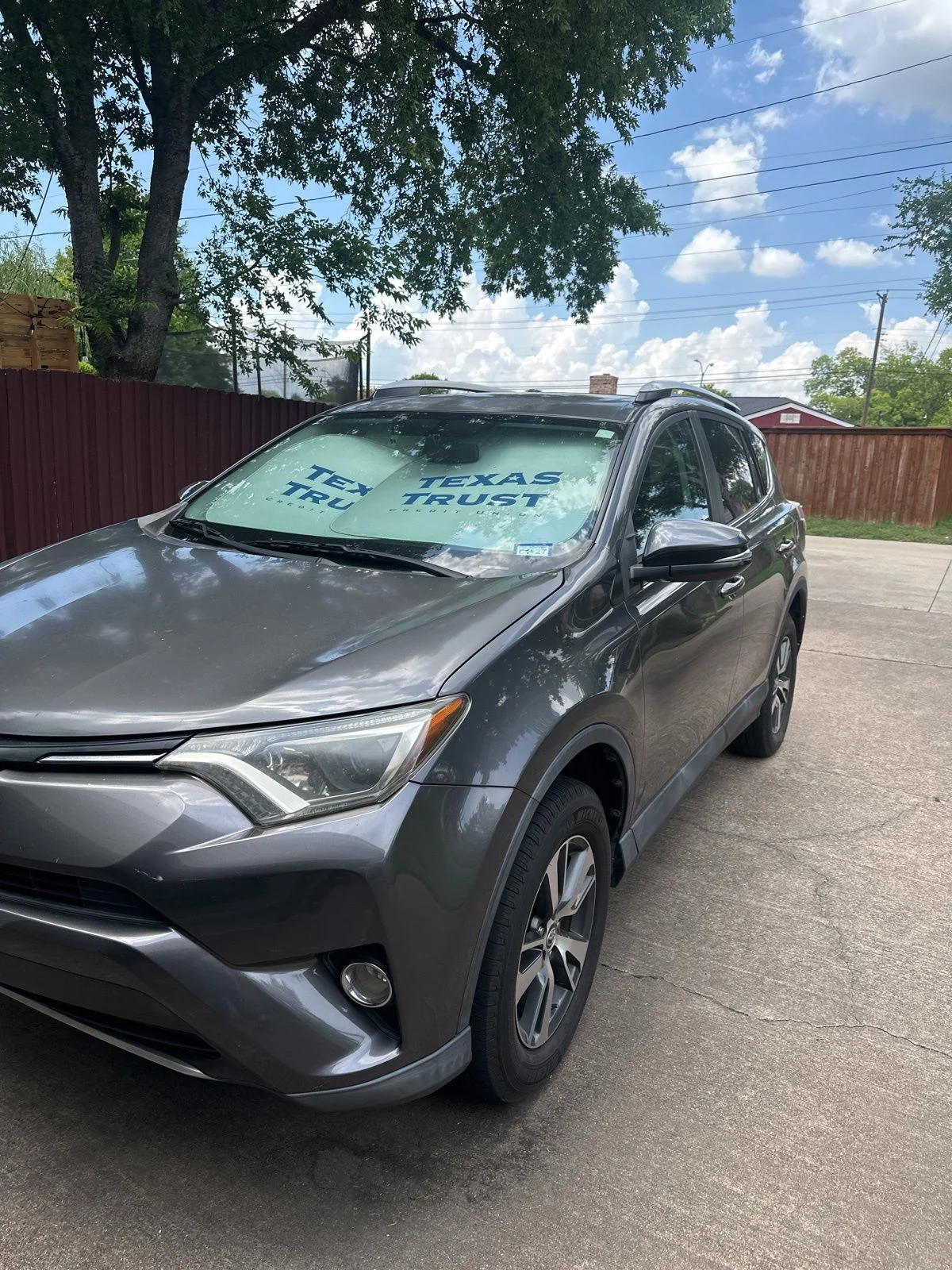 Used 2016 Gray Toyota XLE image 1