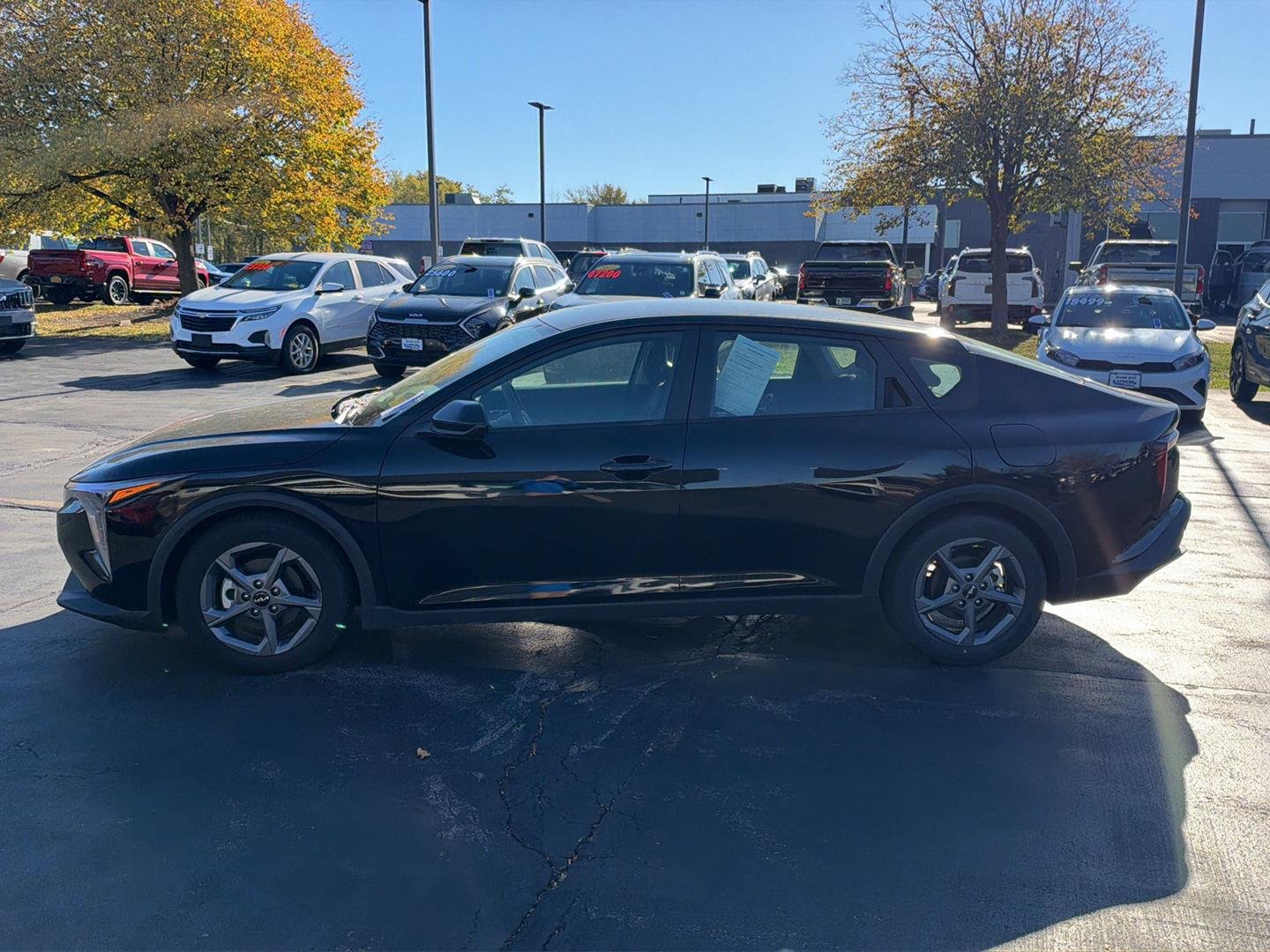 Used 2025 Aurora Black Pearl Kia LXS image 6