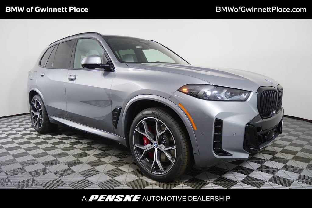Used 2026 Skyscraper Grey Metallic BMW xDrive50e image 1