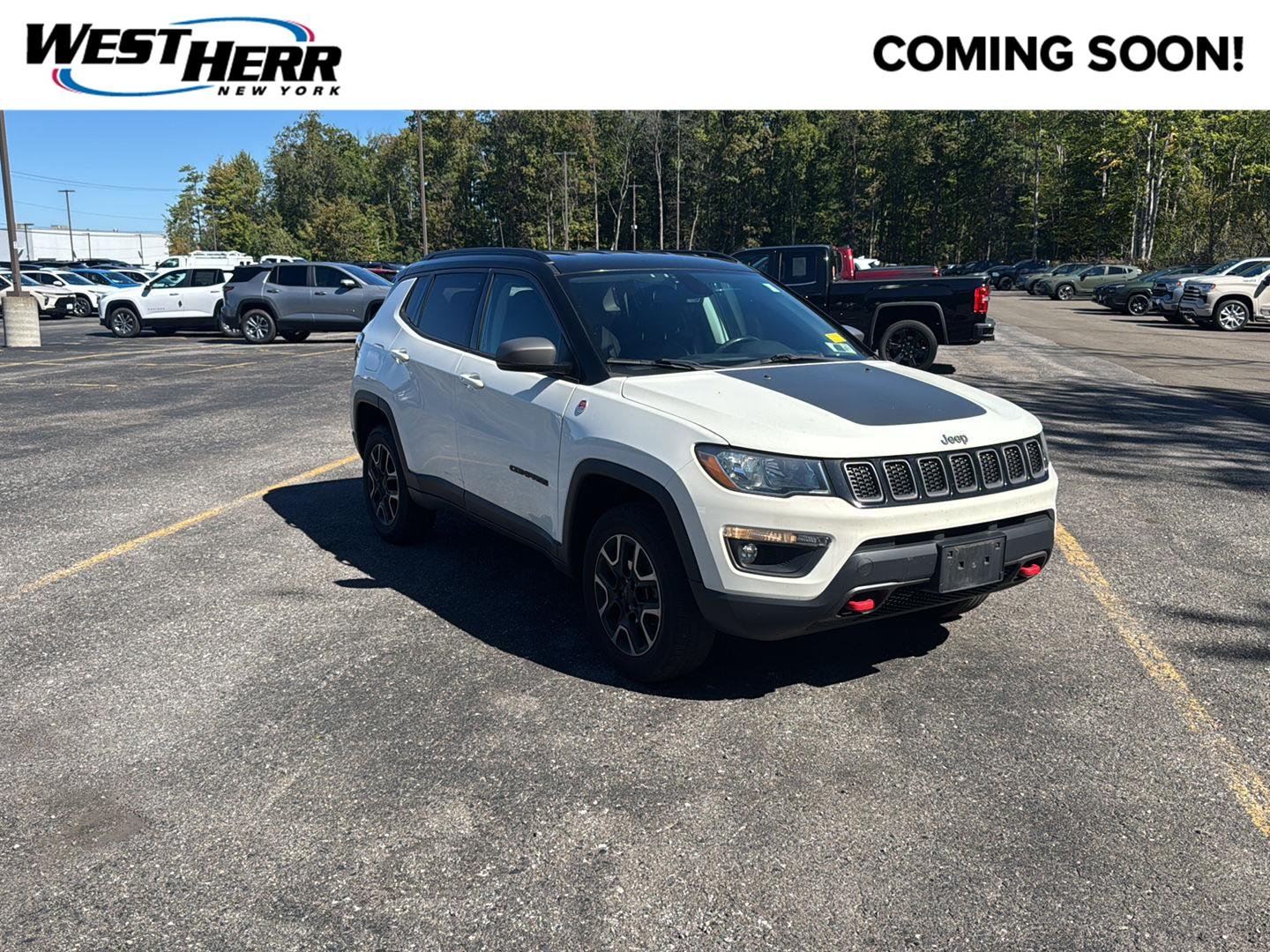 Used 2019 White Clearcoat Jeep Trailhawk image 1