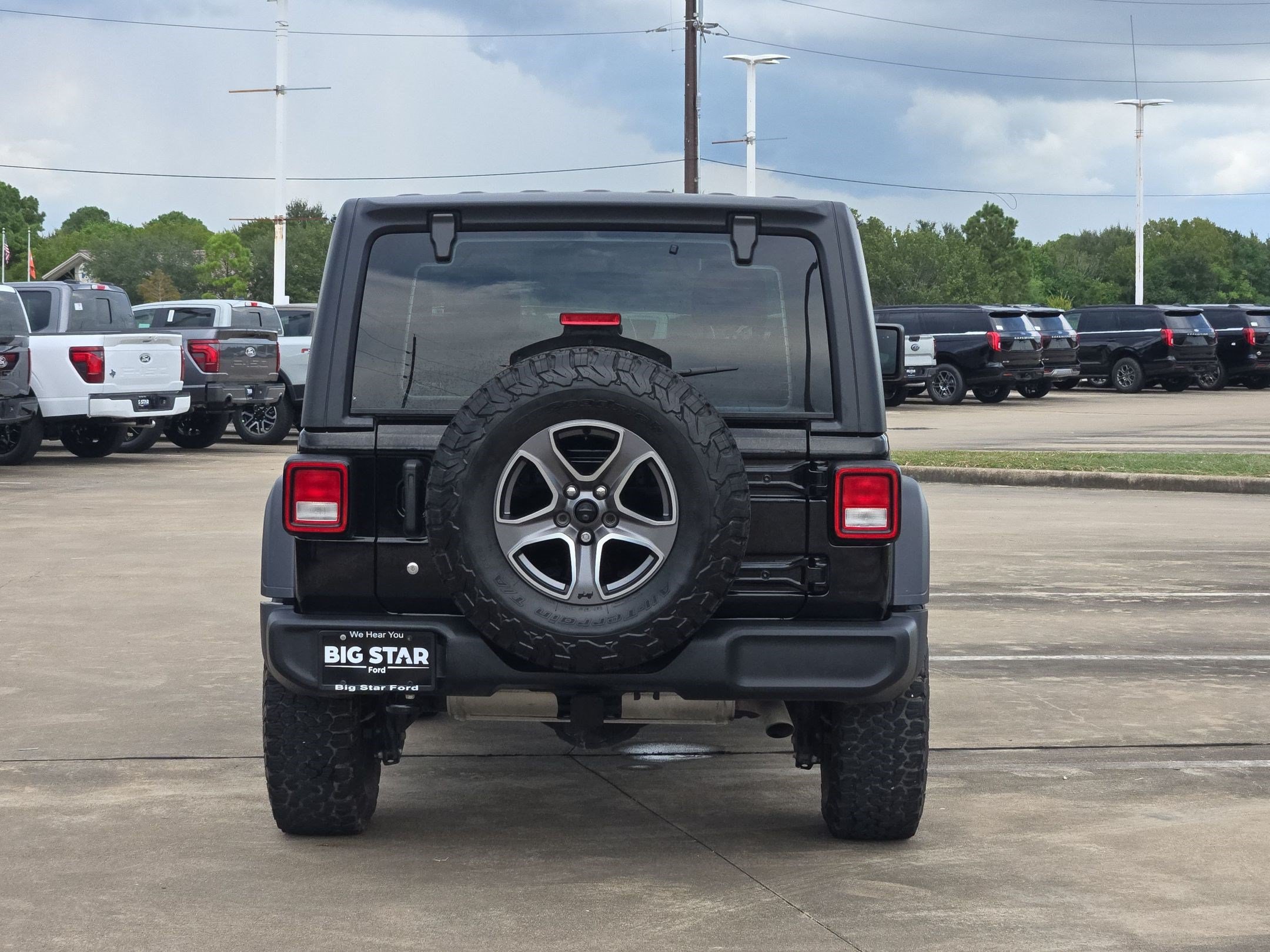 Used 2024 Black Clearcoat Jeep Sport image 4