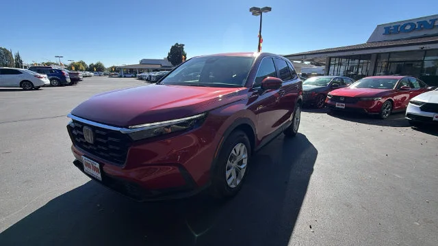 New 2026 Radiant Red Metallic Honda AWD LX image 1
