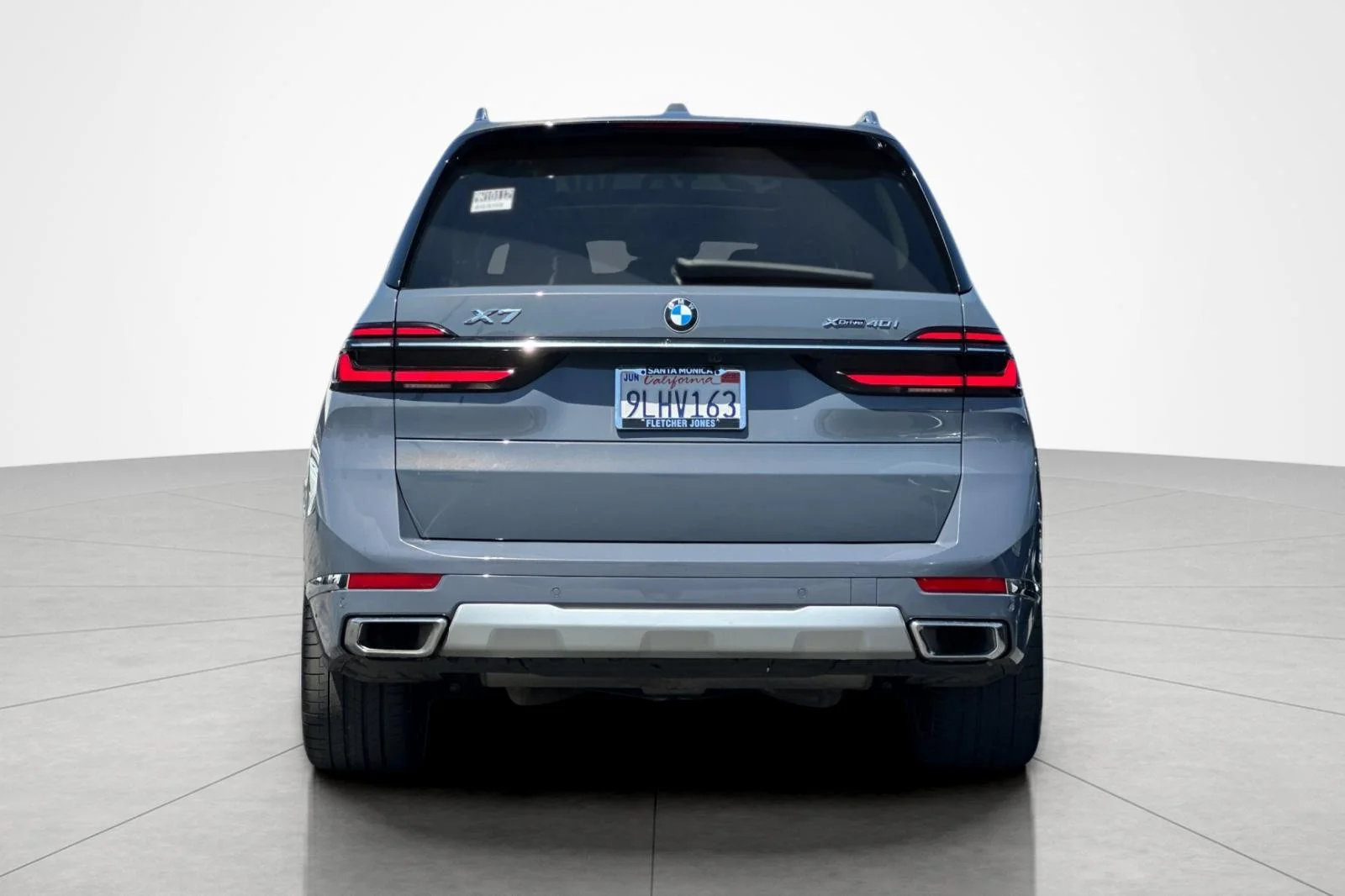 Used 2024 Sparkling Copper Metallic BMW xDrive40i image 4