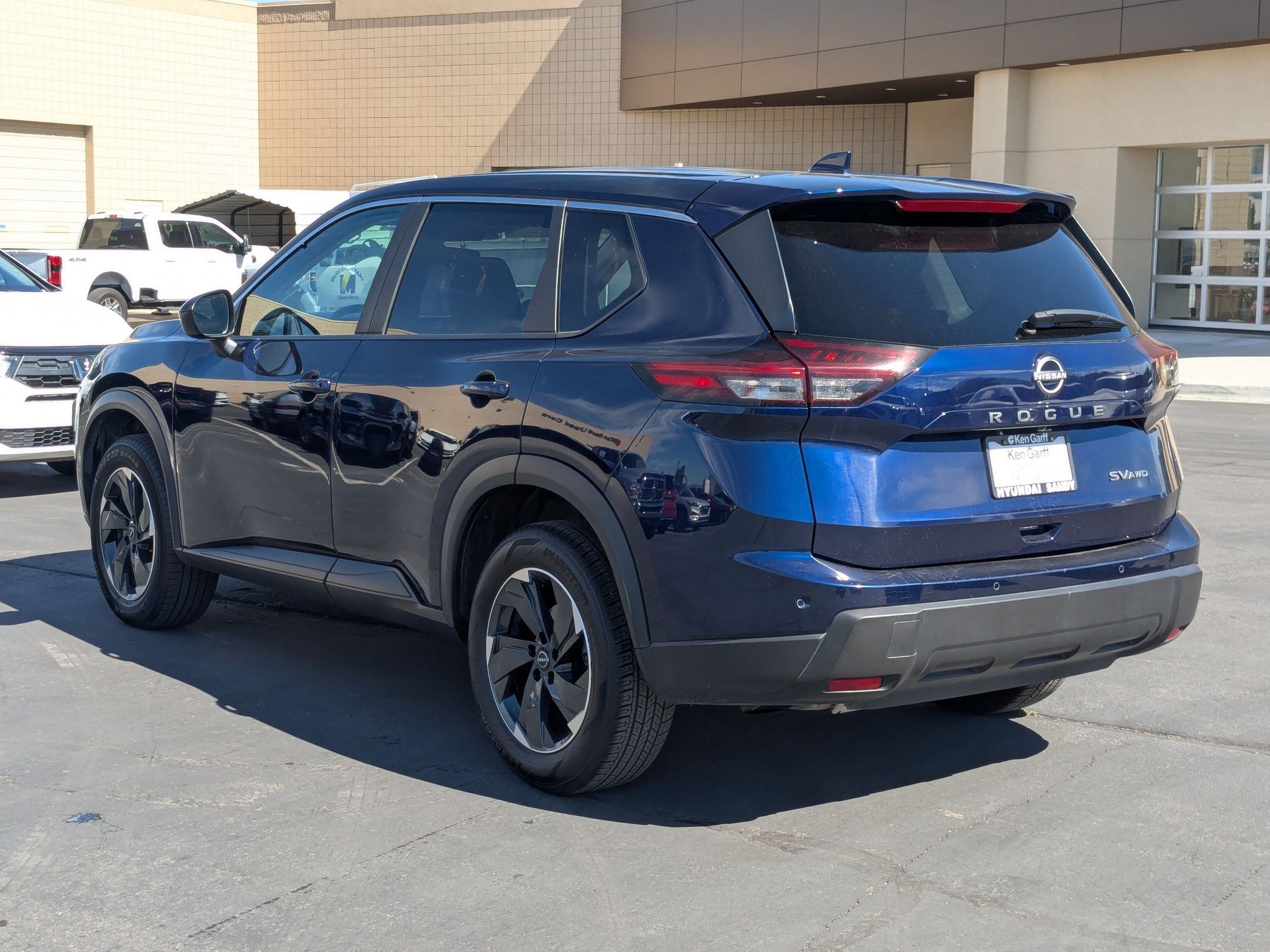 Used 2024 Deep Ocean Blue Pearl Nissan SV image 7