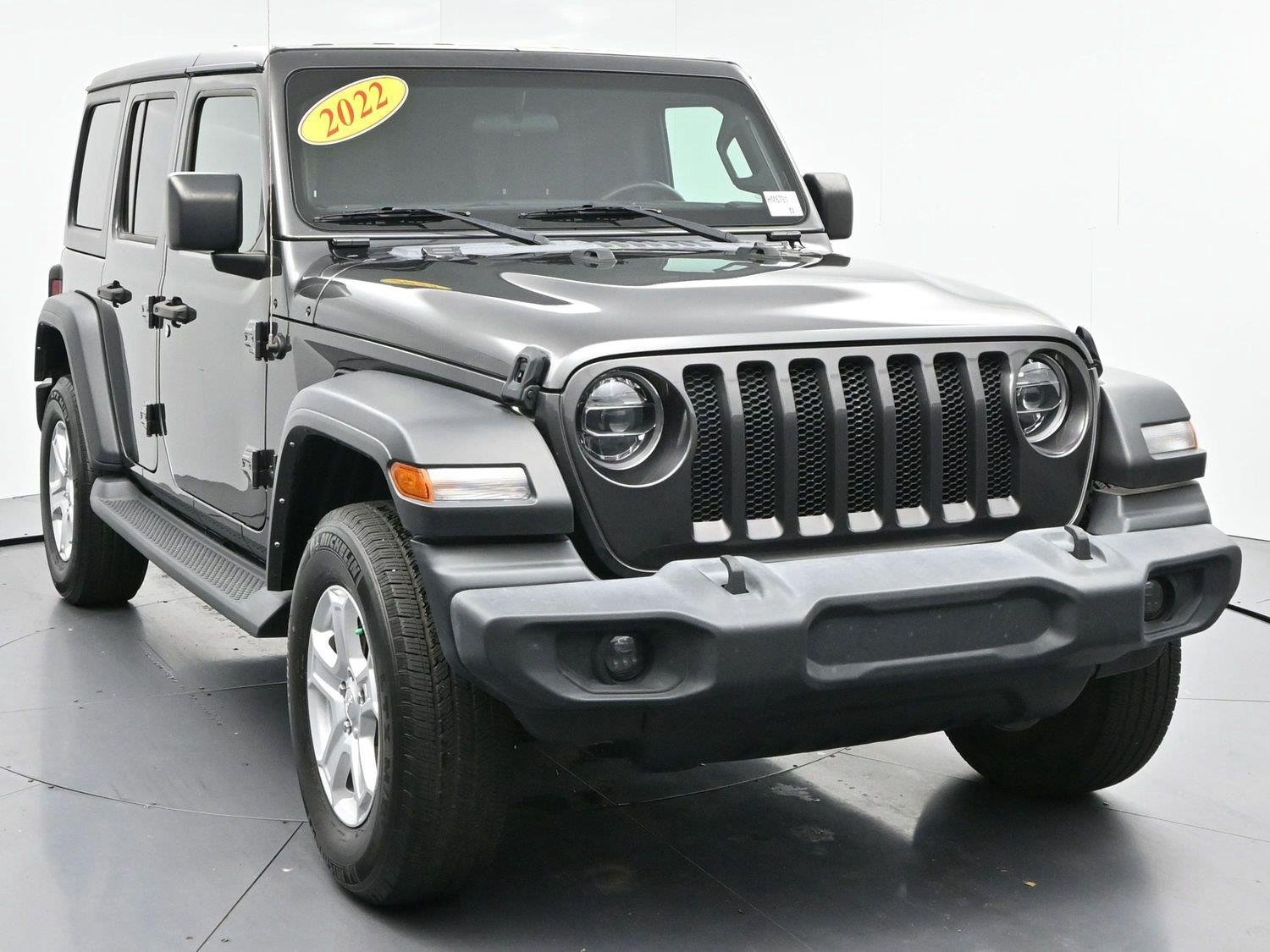 Used 2022 Granite Crystal Metallic Clearcoat Jeep Unlimited Sport S image 2