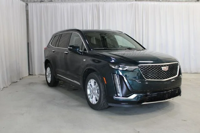 Used 2025 Green Cadillac Luxury image 1
