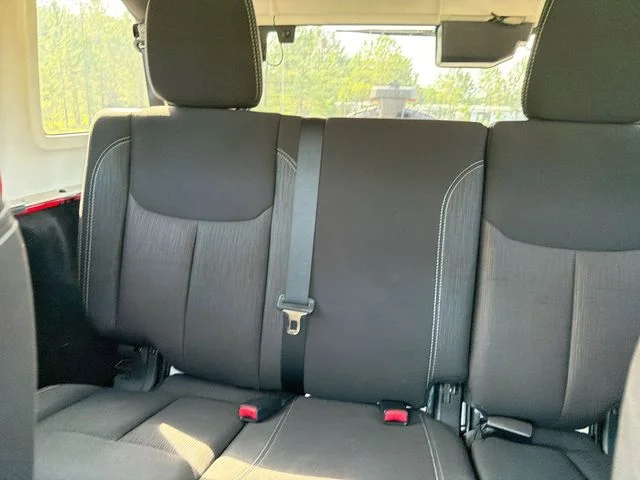 Used 2014 Red Jeep Unlimited Sahara image 22