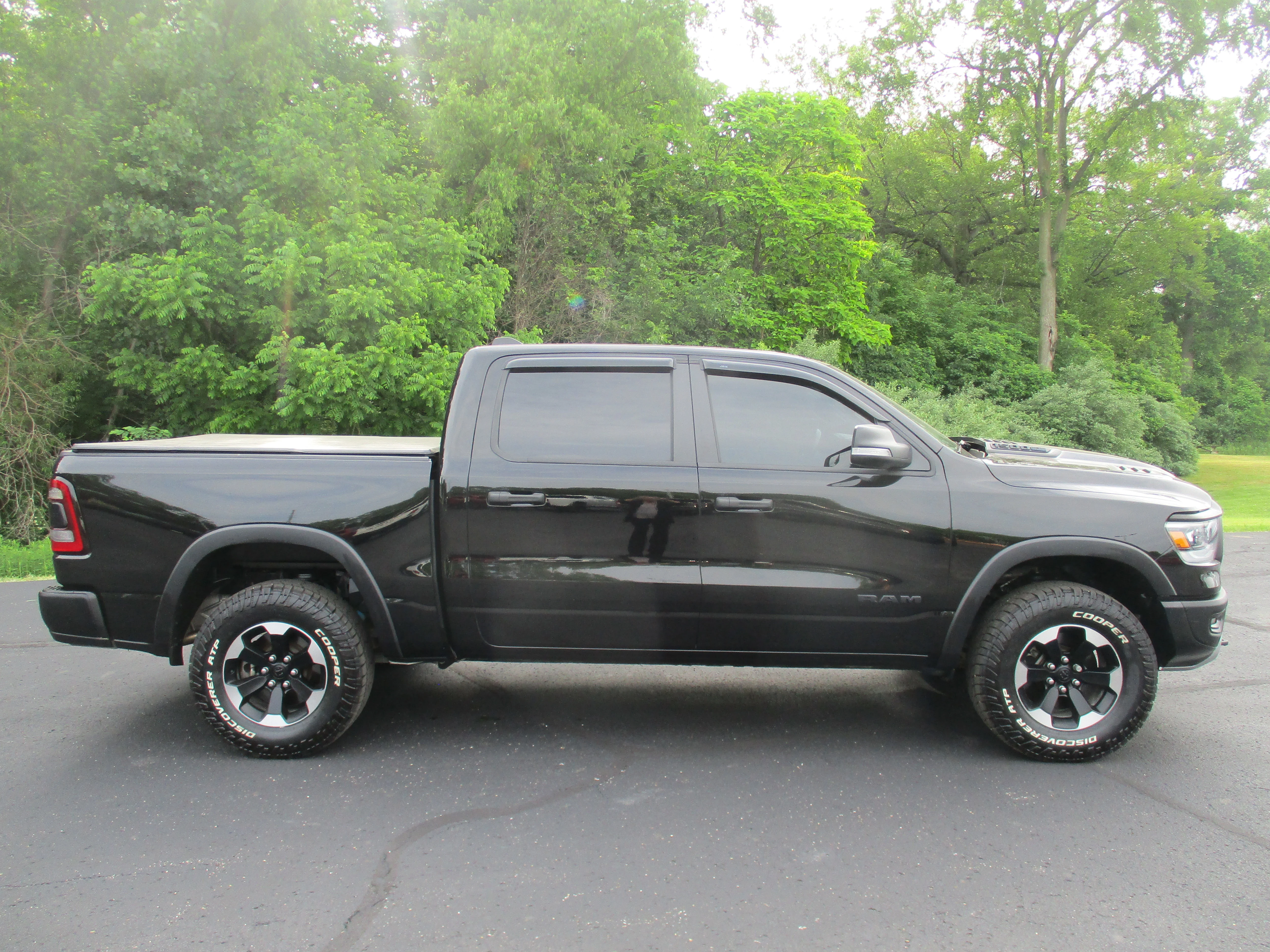 Used 2022 Diamond Black Crystal Pearlcoat Ram Rebel image 46