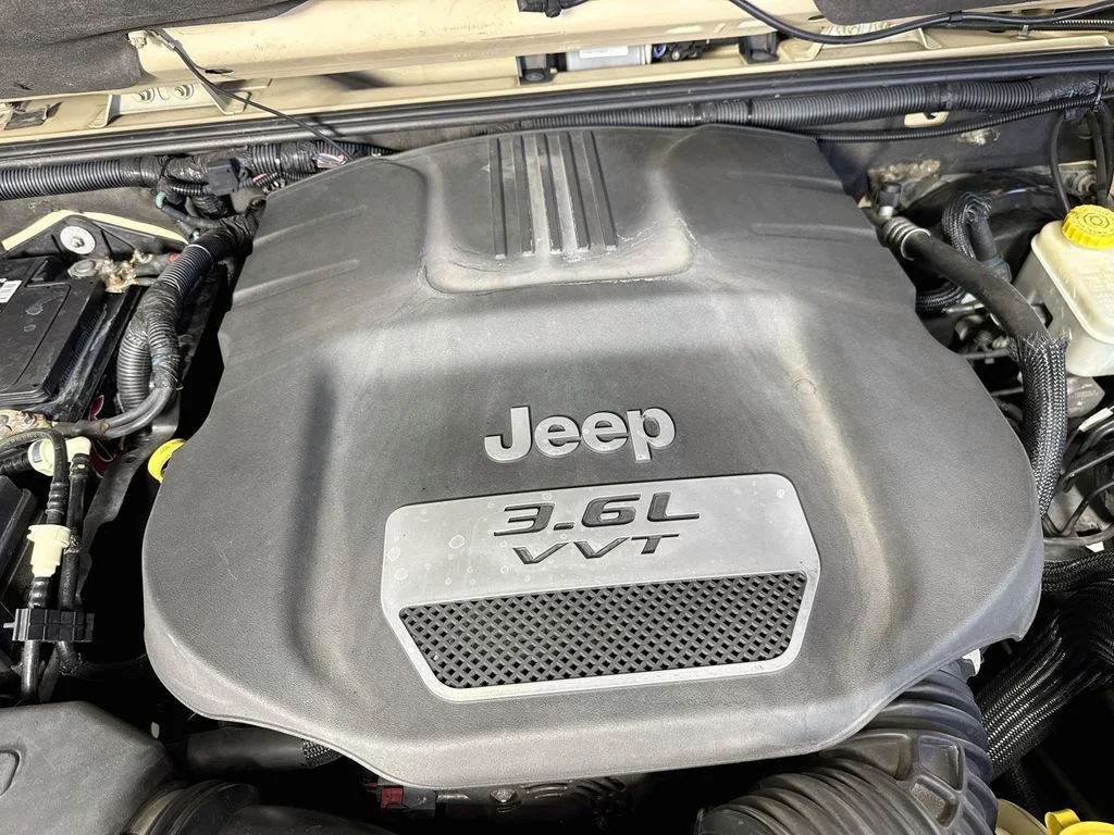 Used 2012 Beige Jeep Unlimited Sahara image 34