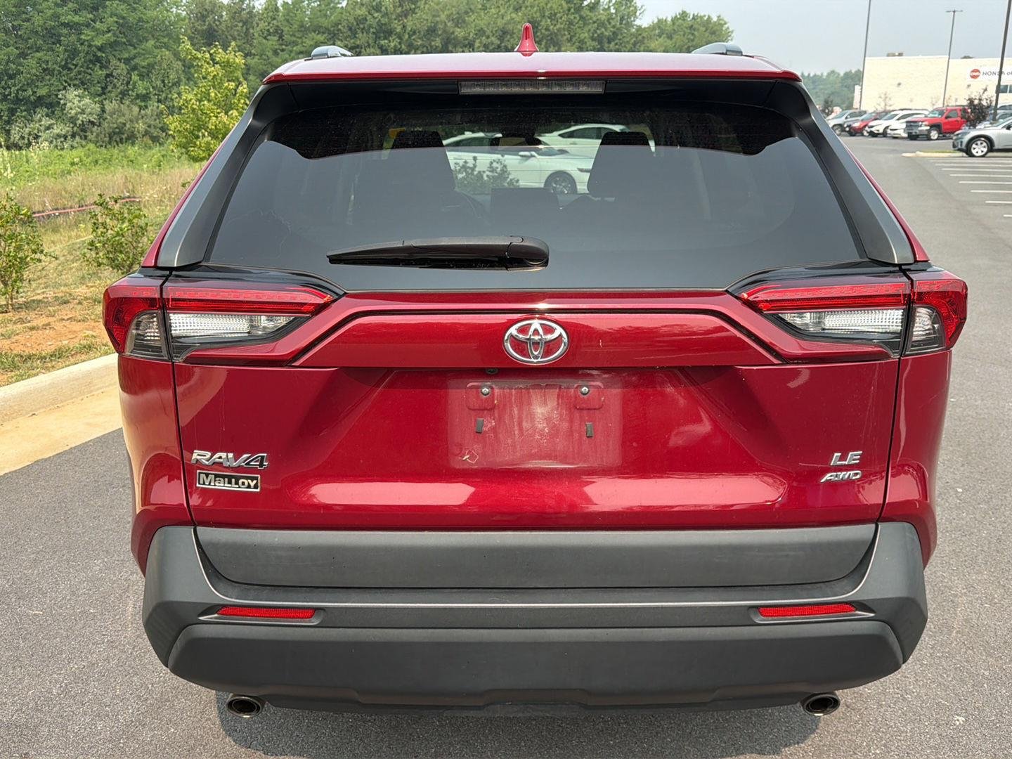 Used 2021 Ruby Flare Pearl Toyota LE image 2