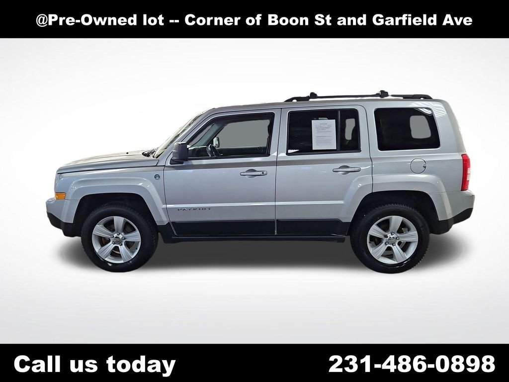 Used 2014 Jeep Patriot Latitude with VIN 1C4NJRFB2ED540837 for sale in Traverse City, MI
