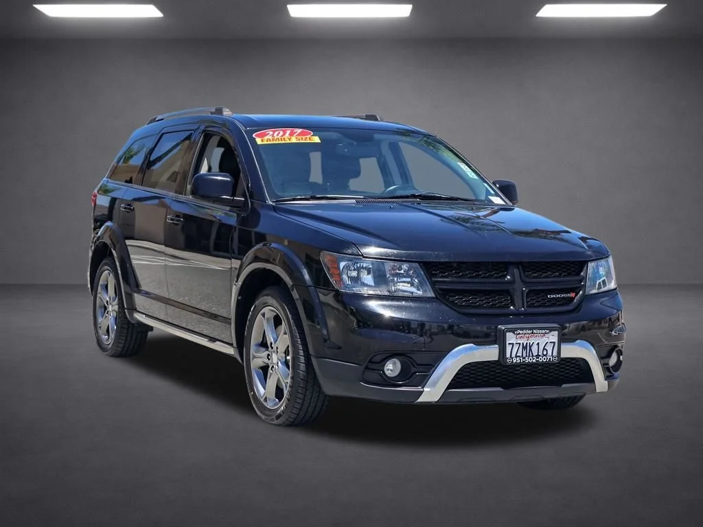 Used 2017 Black Dodge Crossroad image 1