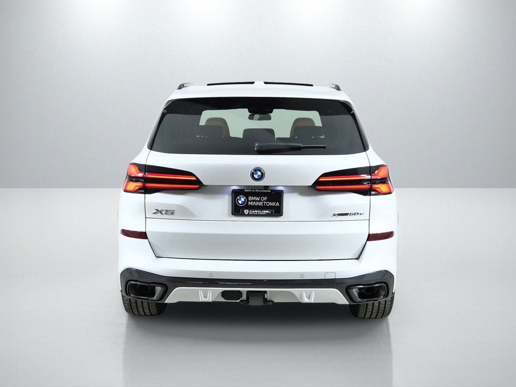 Used 2026 Mineral White Metallic BMW xDrive50e image 11