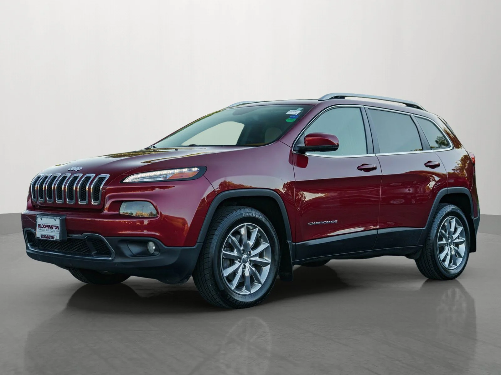 Used 2016 Deep Cherry Red Crystal Pearlcoat Jeep Limited image 3