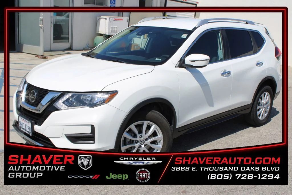 Used 2019 White Nissan SV image 1