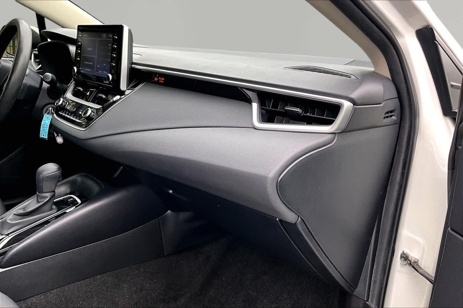 Used 2021 Super White Toyota LE image 19