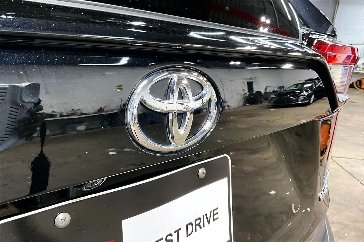 Used 2025 Midnight Black Metallic Toyota Hybrid LE image 31