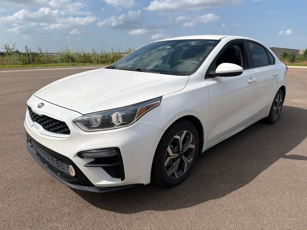 Used 2021 Snow White Pearl Kia LXS image 1