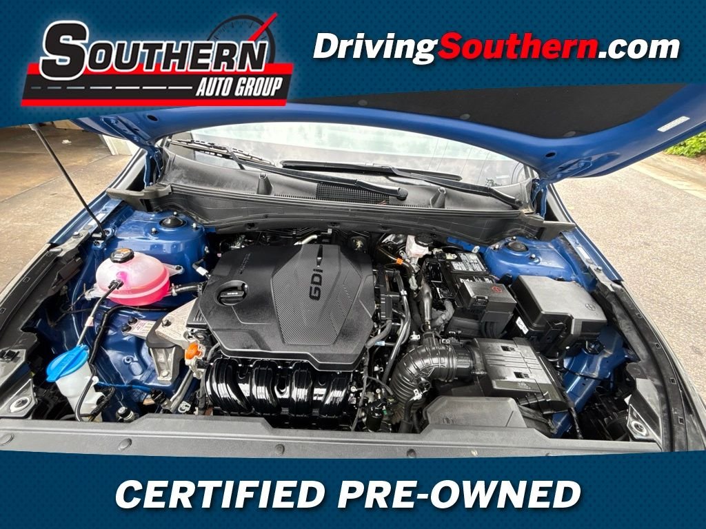 Certified Used 2023 Blue Kia EX image 1