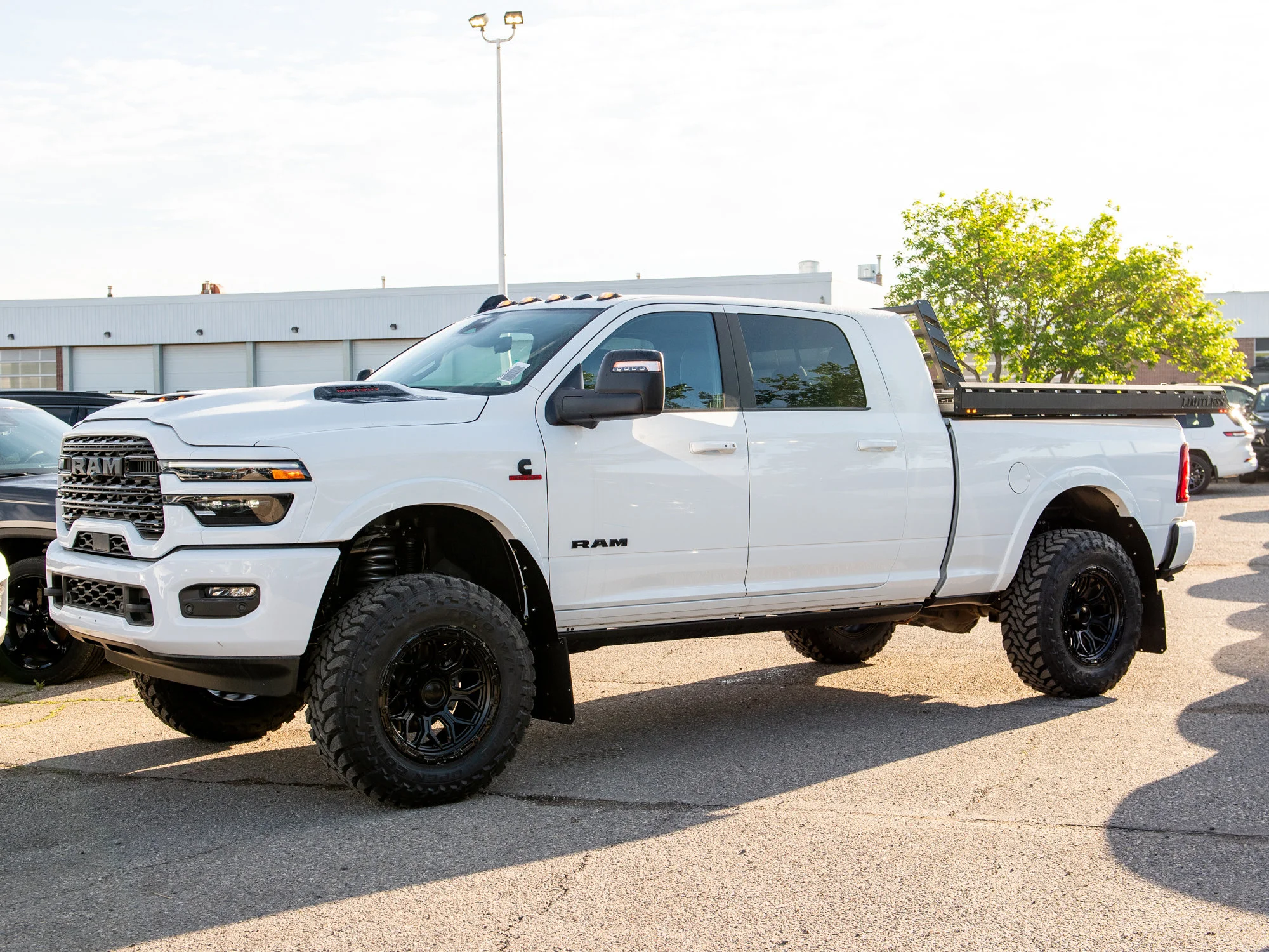 Used 2026 White RAM Limited* Mega Cab, 37 Inch Tires, 5 Inch Lift, Limitless Sled Deck image 5