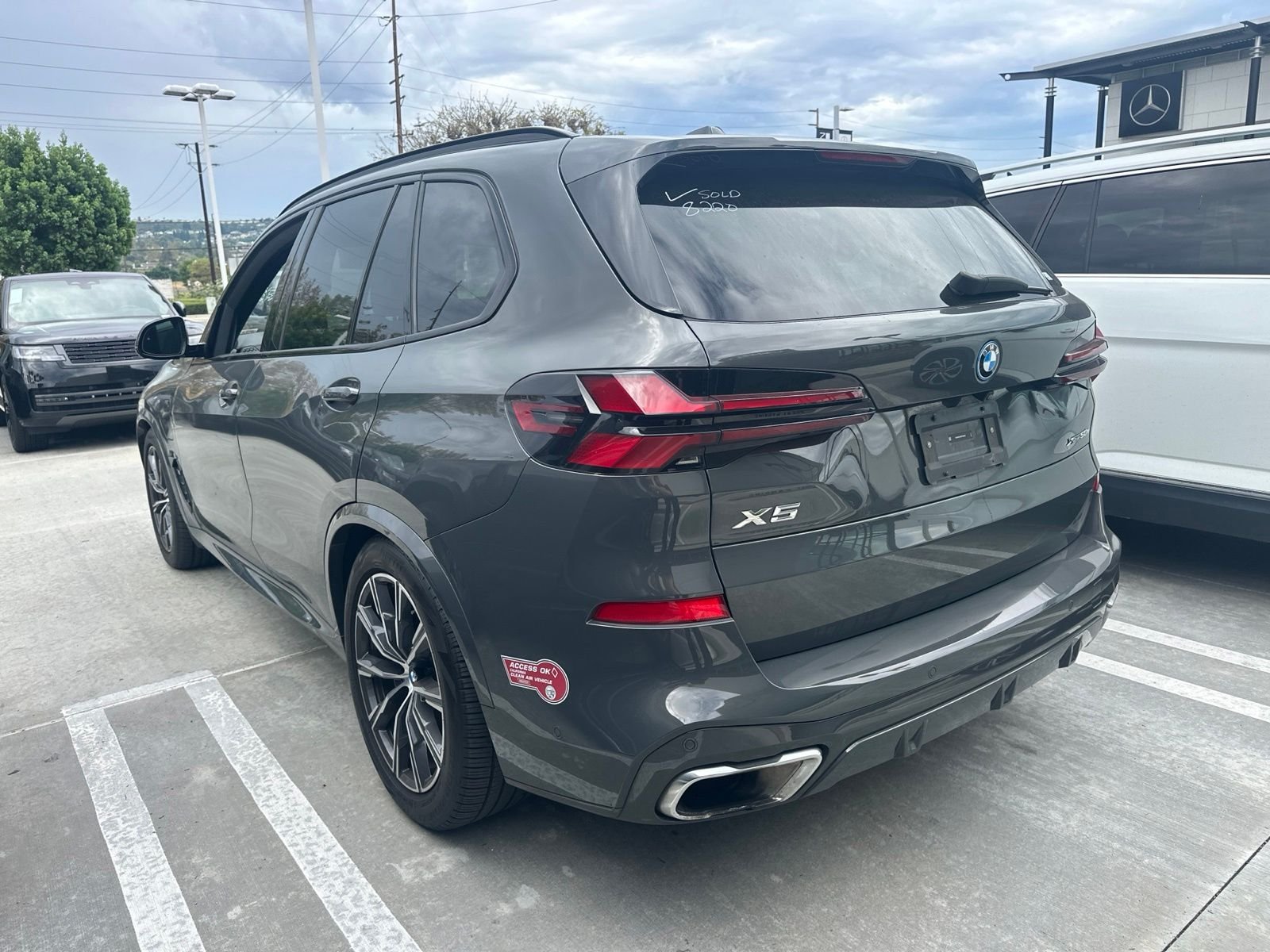 Used 2024 Dravit Gray Metallic BMW xDrive50e image 4