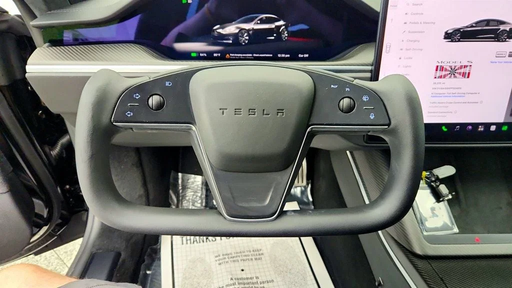 Used 2023 Solid Black Tesla Plaid AWD w/ Yoke Steering Wheel image 13