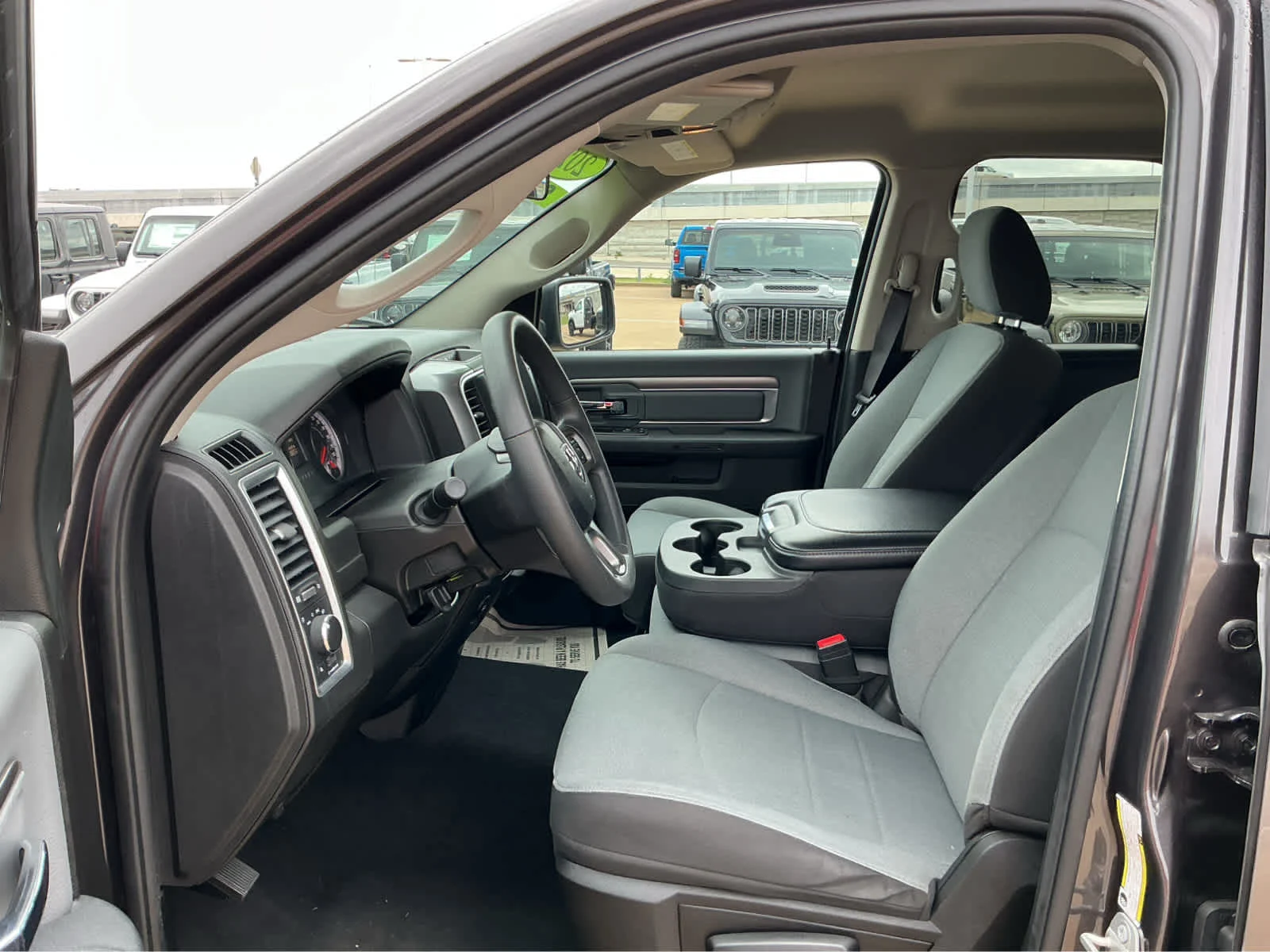 Used 2024 Granite Crystal Metallic Clearcoat Ram SLT image 16
