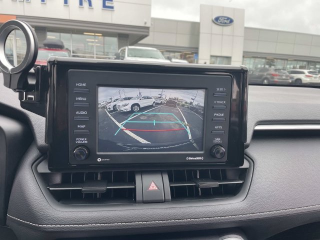 Used 2021 Midnight Black Metallic Toyota LE image 29